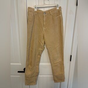 Beige corduroy pants.